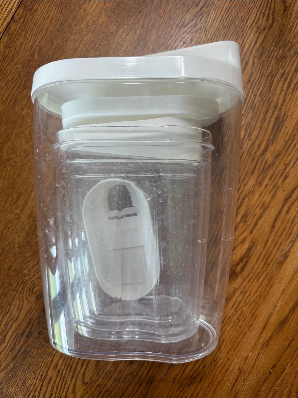 Clear Plastic Oval Pantry Canister with White Lid with a Pouring Spout
